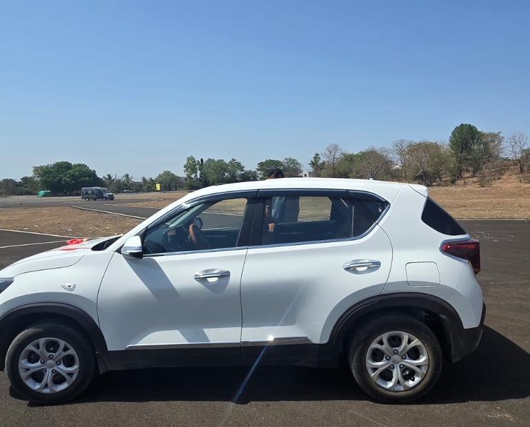 Kia Sonet taxi side view for Gir Gujarat car rental service
