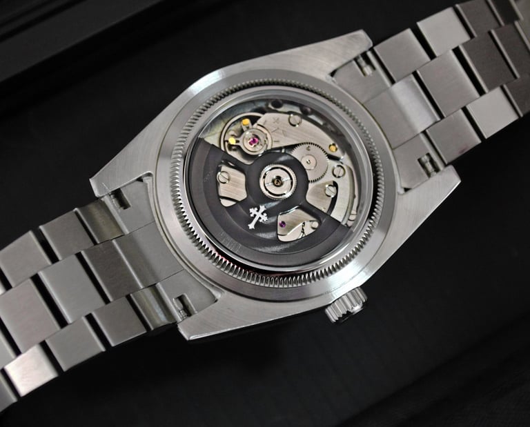 a watch with a metal bracelet