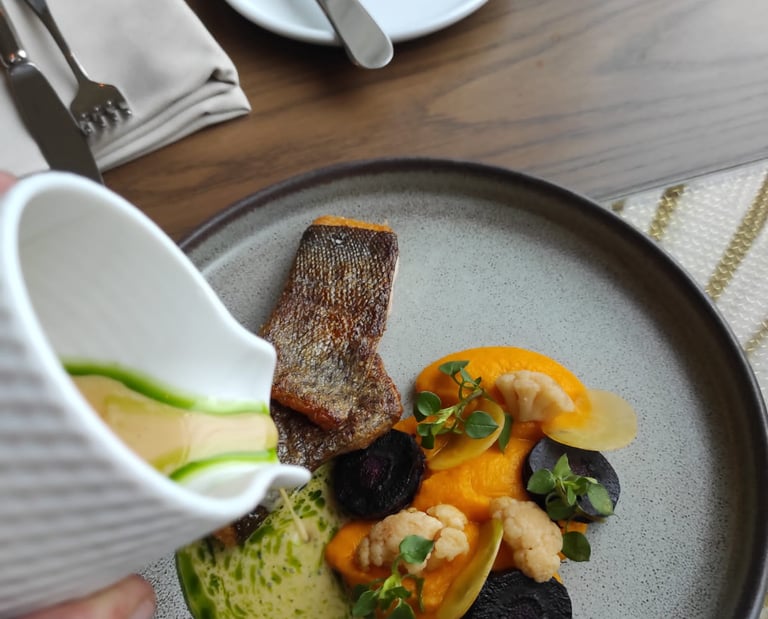 grilled fish with carrot puree and split butter sauce