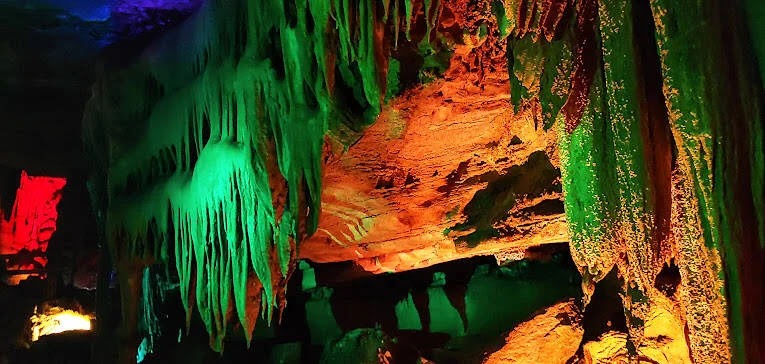 Chattanooga, TN - Colored lights display the stalagmites & stalactite formations at Raccoon Mountain