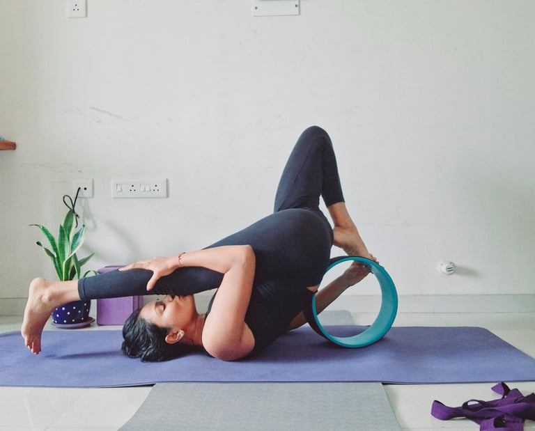 Dr Beauty teaching Yoga online with props