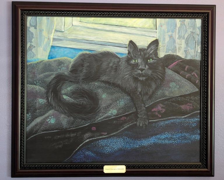 Framed painted portrait of a black long hair cat lounging in front of his window on his bed of blankets.