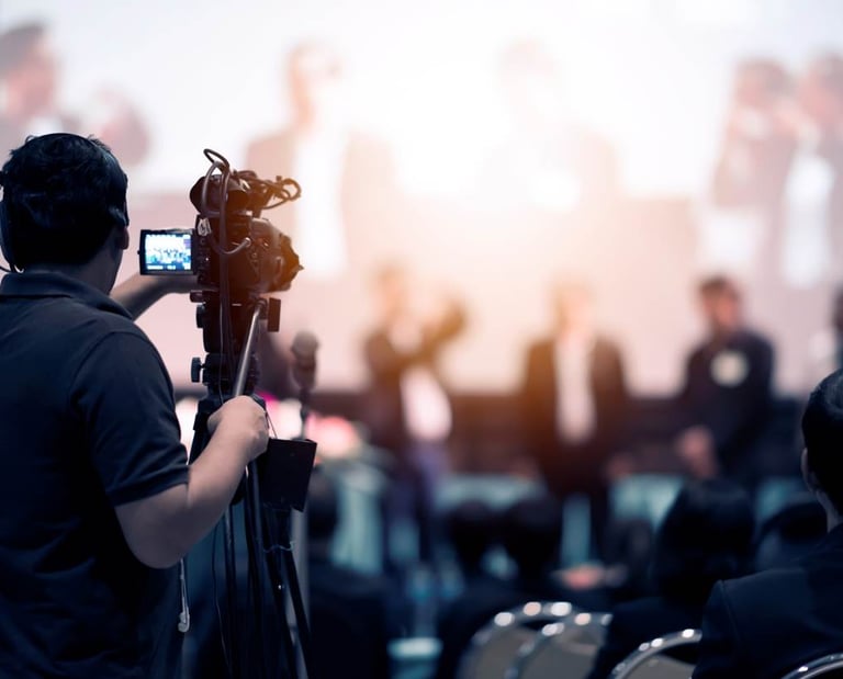 Videographer recording an event