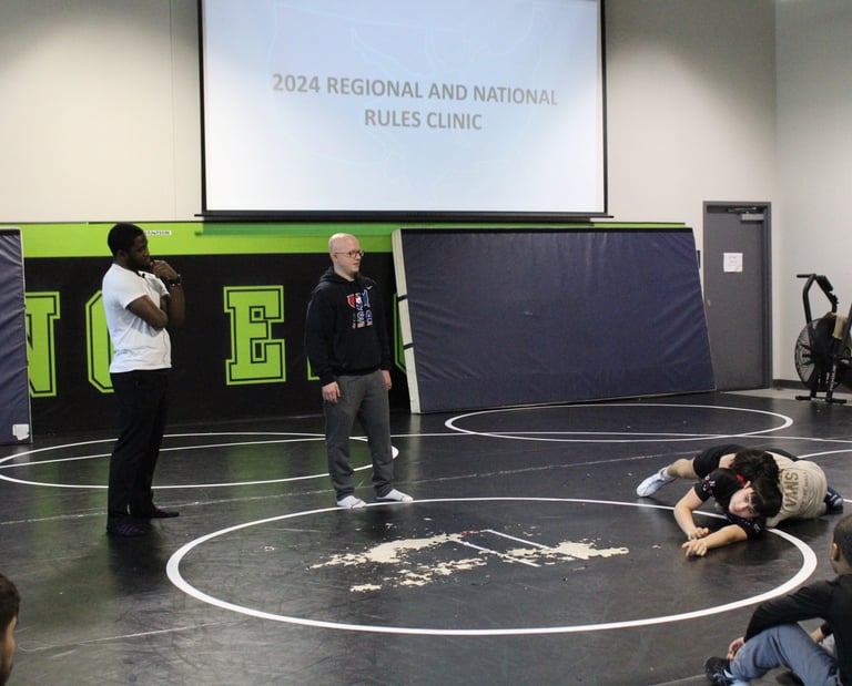 officials and athletes at the rules clinic