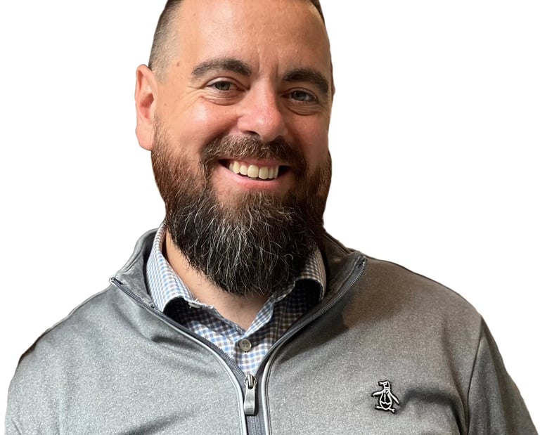 Kevin Gillis, principal mortgage broker and owner at MortgageWell Cornwall, wearing a grey pullover 