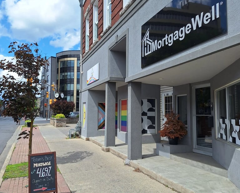 Street view of MortgageWell building in Cornwall with a sign reading 'Today’s Best Mortgage Rate"