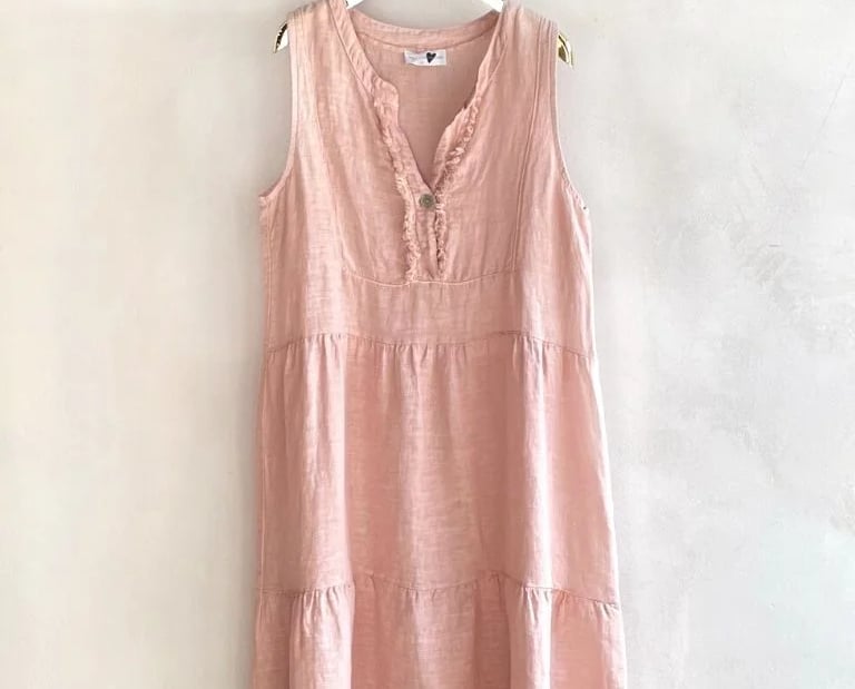 Reparaturen von Textilien wie Kleidern