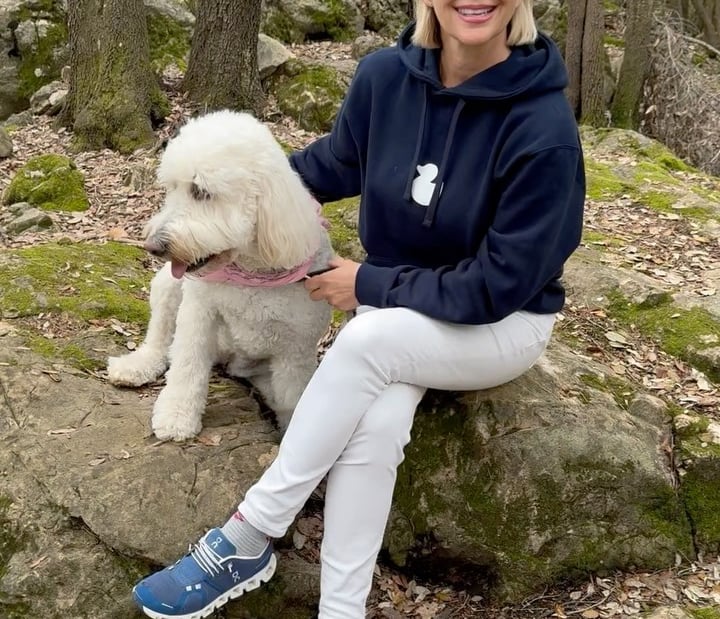 Lu, yacht industry entrepreneur, walking her dog in the countryside on the French Riviera