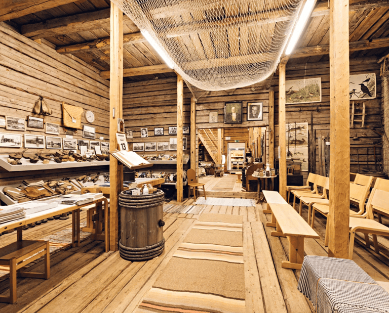 Interior of the Museum of Local History and Culture of Muhos, displaying traditional artifacts insid