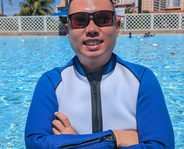 coach ethan oyougu aquatics