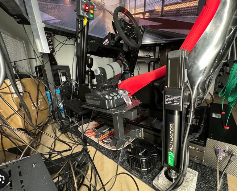 https://www.reddit.com/r/simracing/comments/19bgpz0/cable_management_nightmare_bi_polar_sim_build/