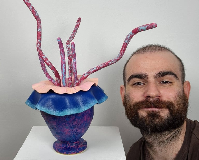 Sylvester Zagato and one of his sculpture