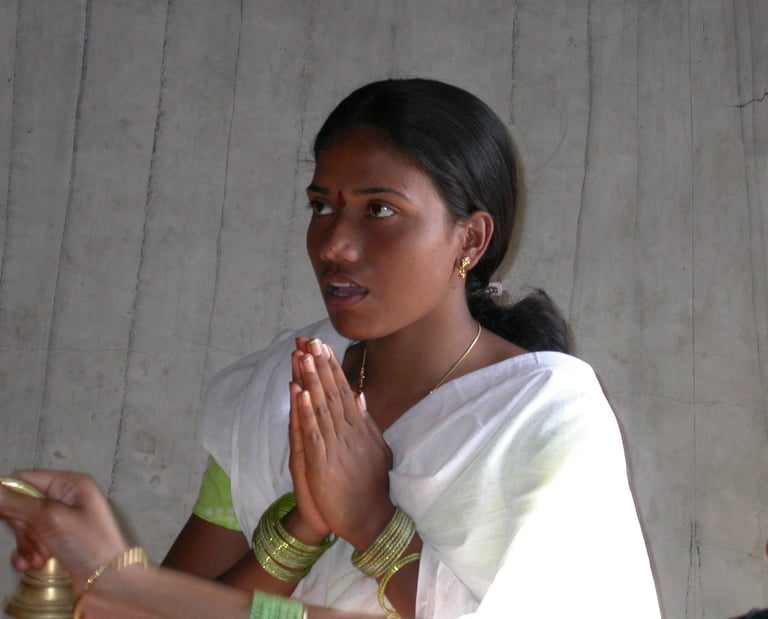 Indian Girl praying to the Goddess