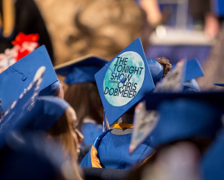 Chris Dobmeier's graduation cap - cap with a message on it