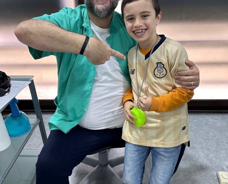 a man and a boy are posing for a picture