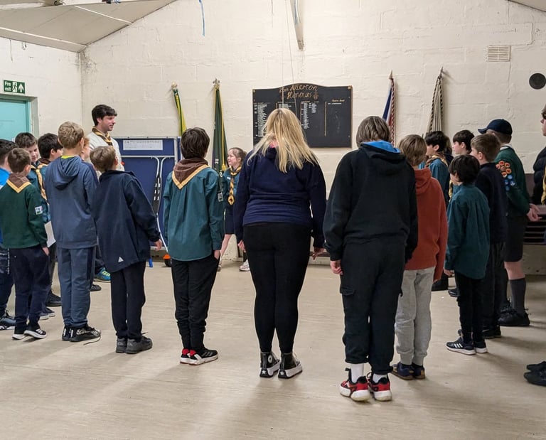 Scouts and young leaders gather for flag break in Grassendale