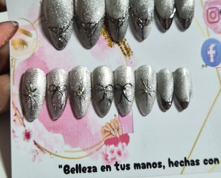 a person holding a card with a picture of a woman's nails