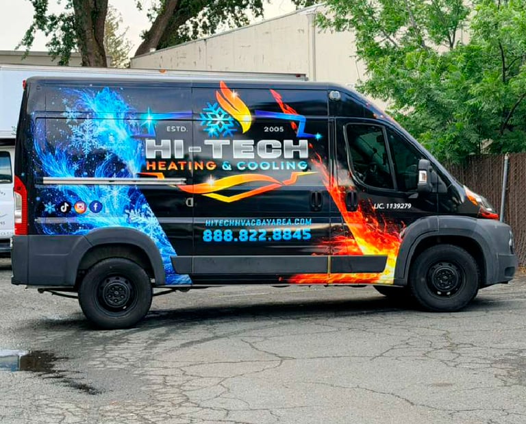 Hi-Tech Heating and Cooling service van with fire and ice graphics parked outdoors.