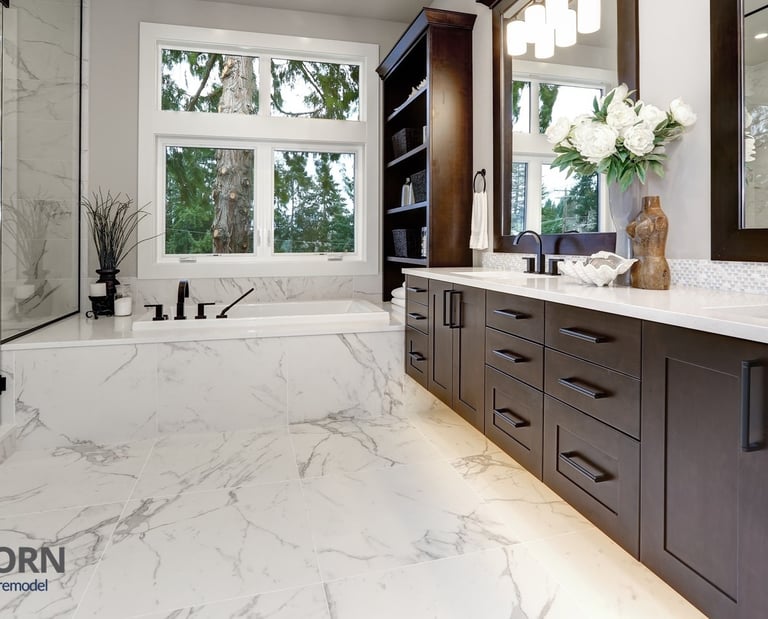 Modern bathroom with walk‑in glass shower, large vanity, and contemporary tile design