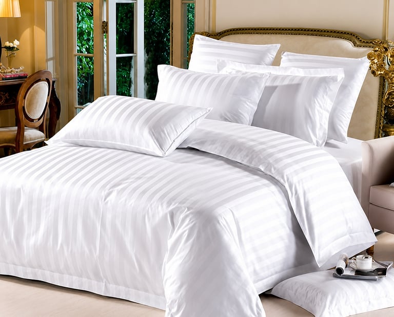 Luxury bed linen collection featuring elegant bedsheets, soft pillows, duvet covers, mattress