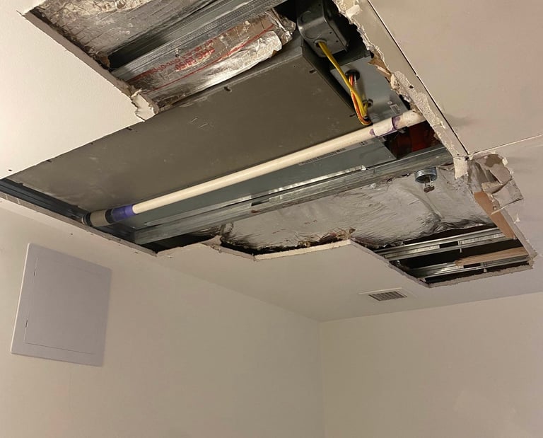 drywall cut out to access electrical wires