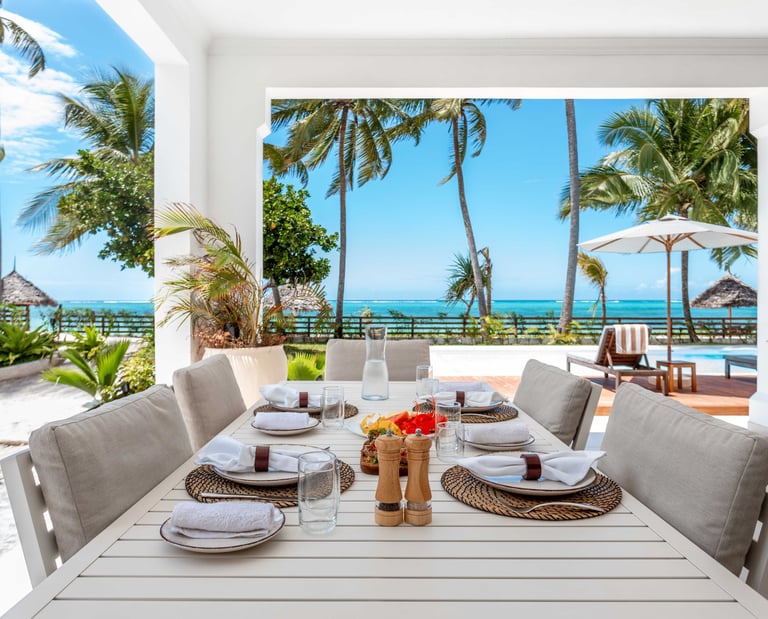 a table setting for eight at Villa Serene Zanzibar 