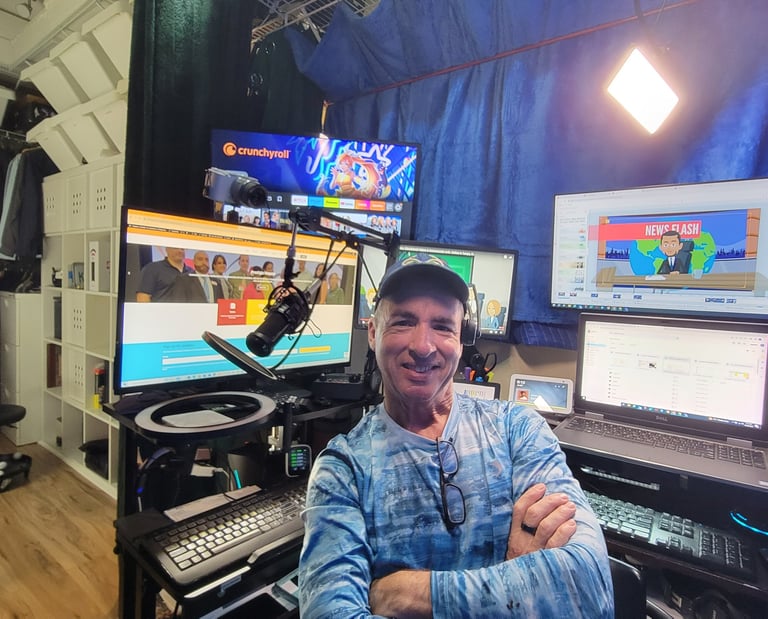 Eric DeRise, a dynamic Instructional Designer and Video Producer working in his studio.