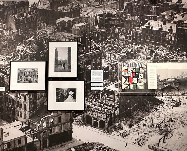 Western Germany, 1952-1953 Cologne, along a busy street, amidst ruins, modern stores have opened