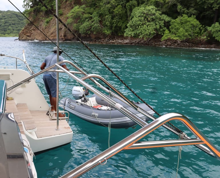Kephas catamaran anchored in pristine turquoise bay during private tour in Papagayo