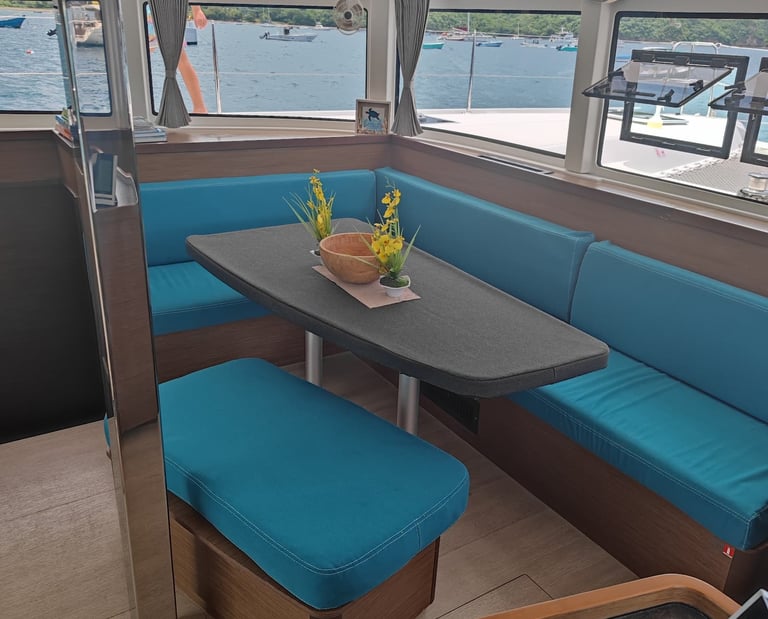 Comfortable air-conditioned interior lounge of private catamaran in Papagayo Gulf