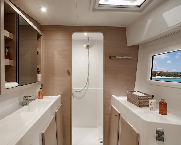 Modern private bathroom inside Kephas luxury catamaran in Costa Rica