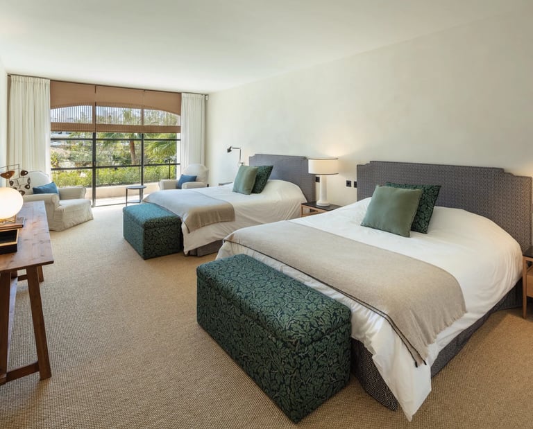 Guest suite at Villa La Gratitud with twin king size beds