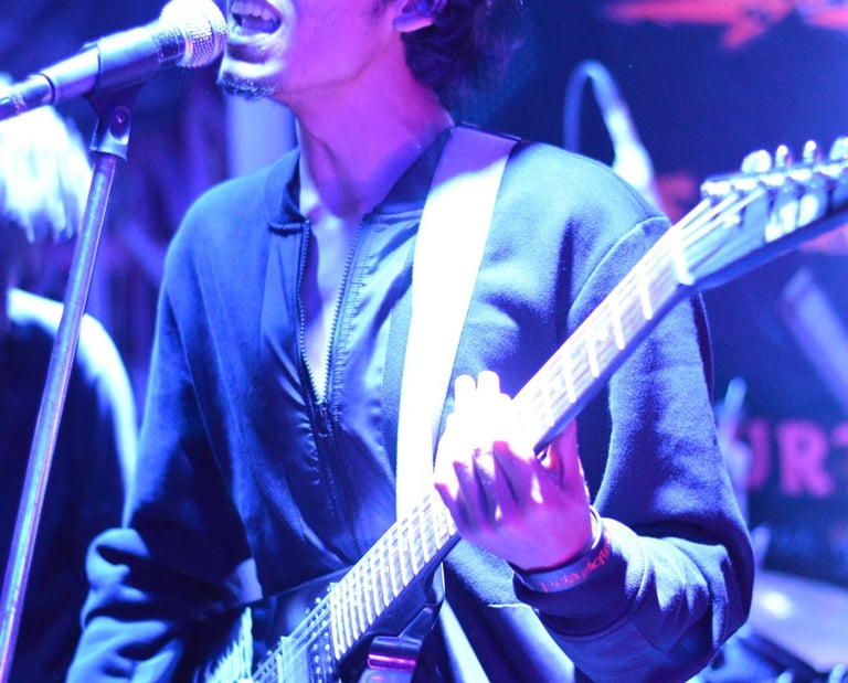 Rishikesh Dharap, a guitarist, performs with his band Ephemeral at an Orange Octopus event in 2016