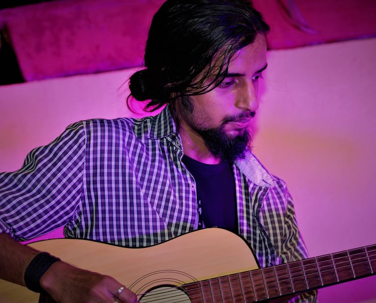 Mradul Singhal, a singer-songwriter performs at an Orange Octopus event in 2017.