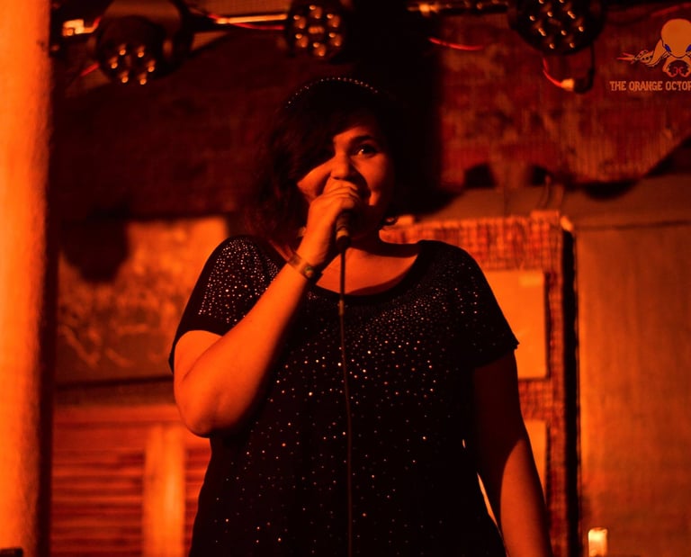 Aayushi Jagad, a stand up comedian performs at an Orange Octopus event in 2017.