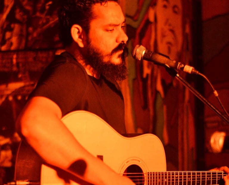 Zane Rodrigues, a singer-songwriter performs at an Orange Octopus event in 2017.