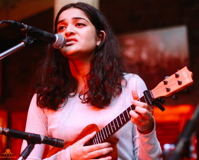 Mansi Manohar, a singer-songwriter performs at an Orange Octopus event in 2017.