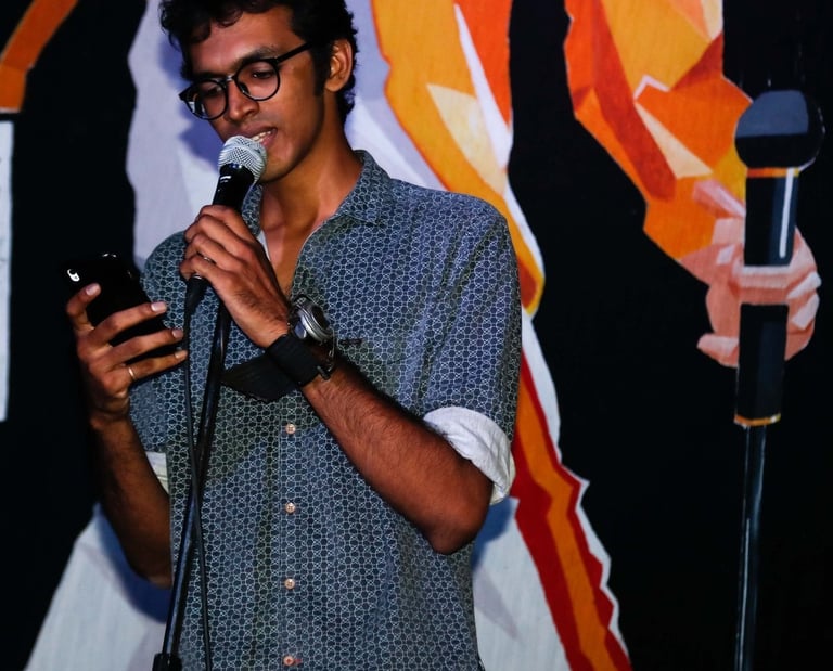 KC Vlaine, a singer-songwriter performs at an Orange Octopus event in 2018