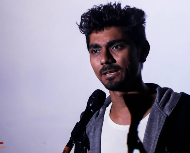 Saanjhj, a poet performs at an Orange Octopus event in 2018