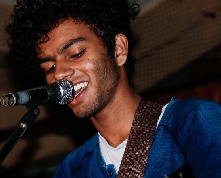 Himanshu Chavan, a singer-songwriter performs at an Orange Octopus event in 2018