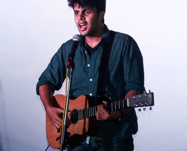 Akshit Dhall, a singer-songwriter performs at an Orange Octopus event in 2018.