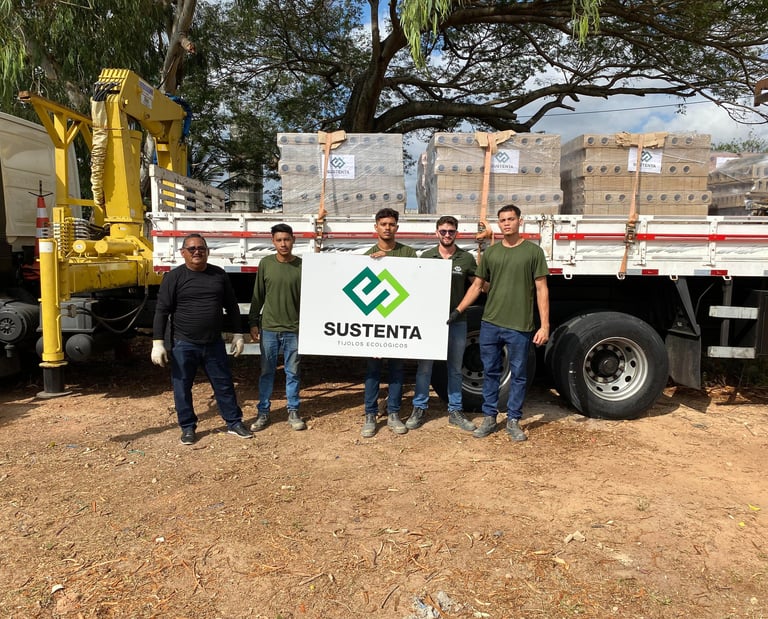 a group of men standing in front of a truck