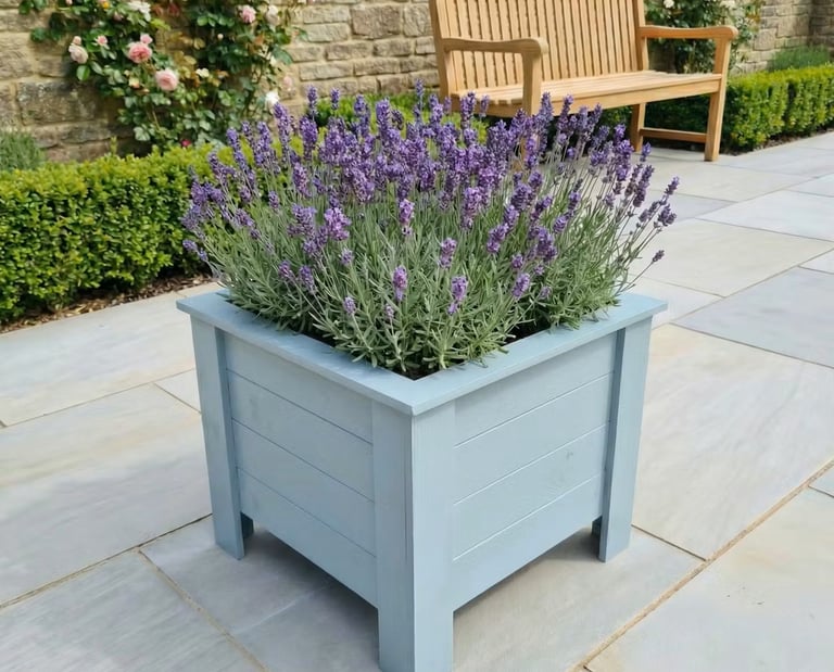 handmade planter on legs aston made from wood quality plant box painted in farrow and ball ovel blue colour garden decor