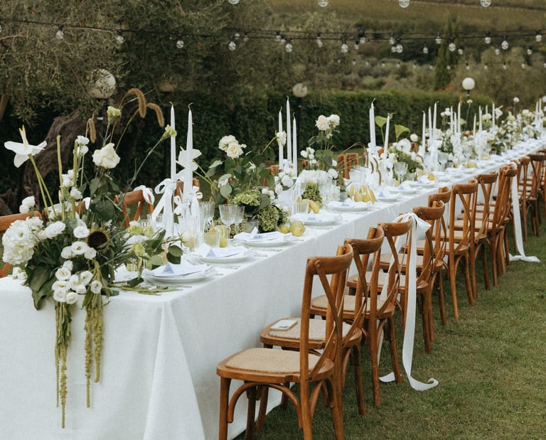 a long table with a long table set for a wedding in Tuscany