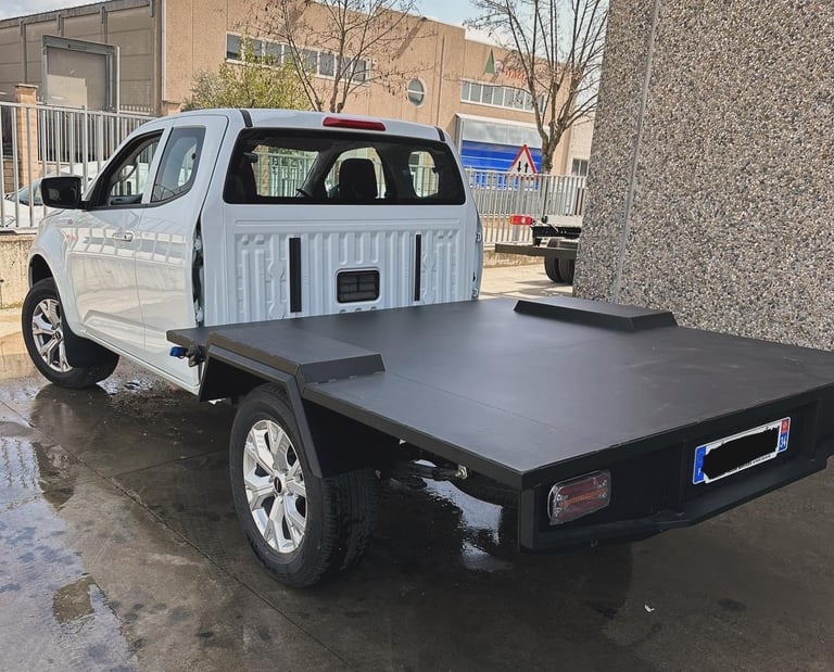 a pick-up truck with a platform