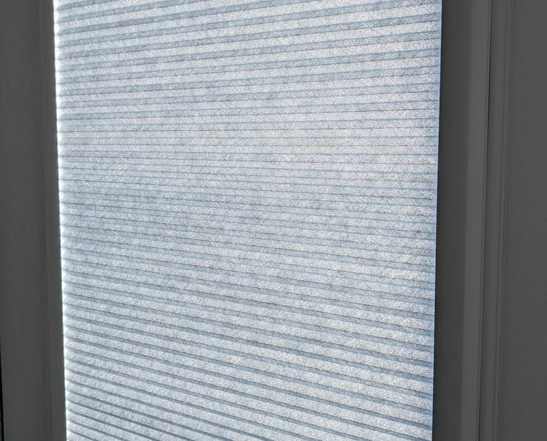 Perfect Fit honeycomb blind installed in uPVC window in Aberdeen