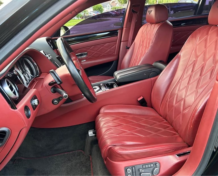 Red leather bently car detailing interior