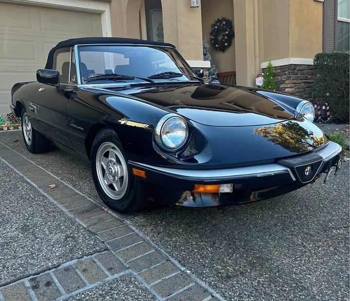 Black Alfa Romeo after car wash by road hog detailing
