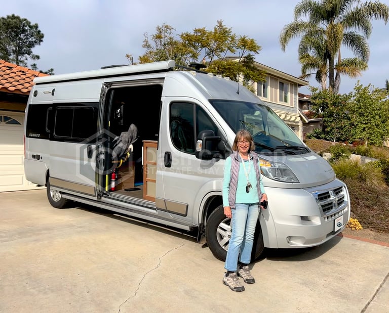 Lady standing in front of her Ram Travato 2017