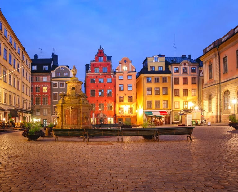Historic Stortorget public square in Stockholm Gamla Stan with colorful medieval buildings and cobblestone.